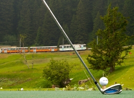 practice range with mountain railway