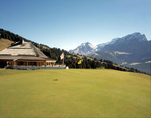 villars golf course with mountain backdrop green